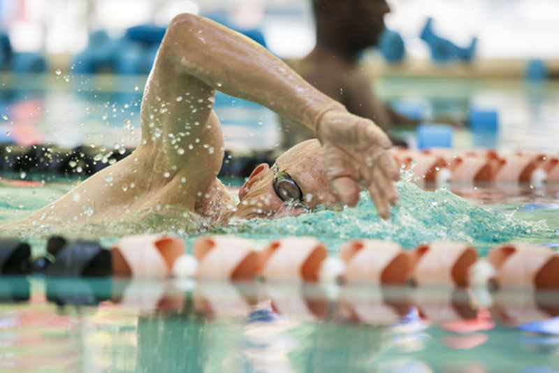 Senior man swimming